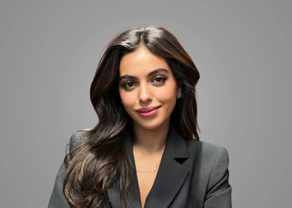 Portrait of an Elevate Wealth team member in a black blazer